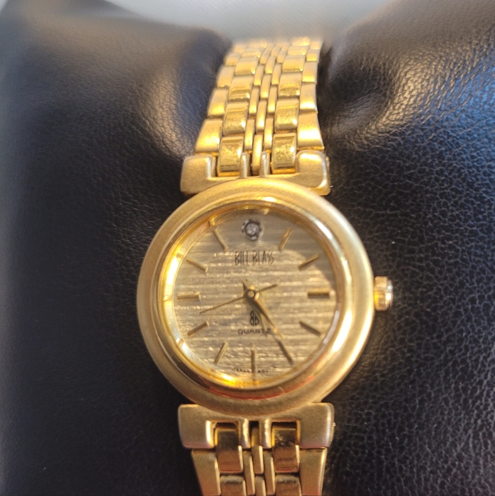 BILL BLASS Ladies' Quartz Analog Watch Gold Tone With Diamond Chip